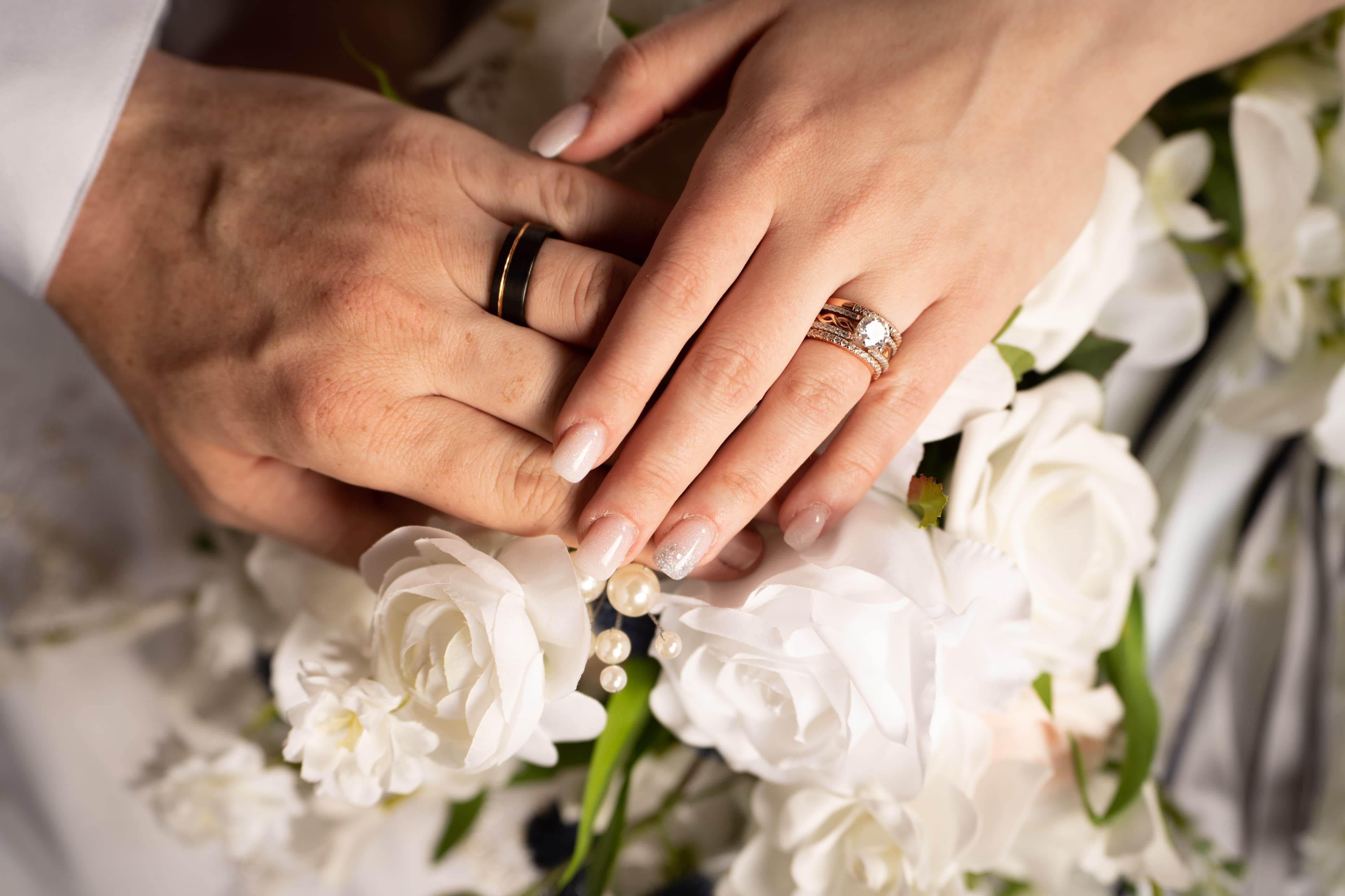 Two rings on a bouquet.