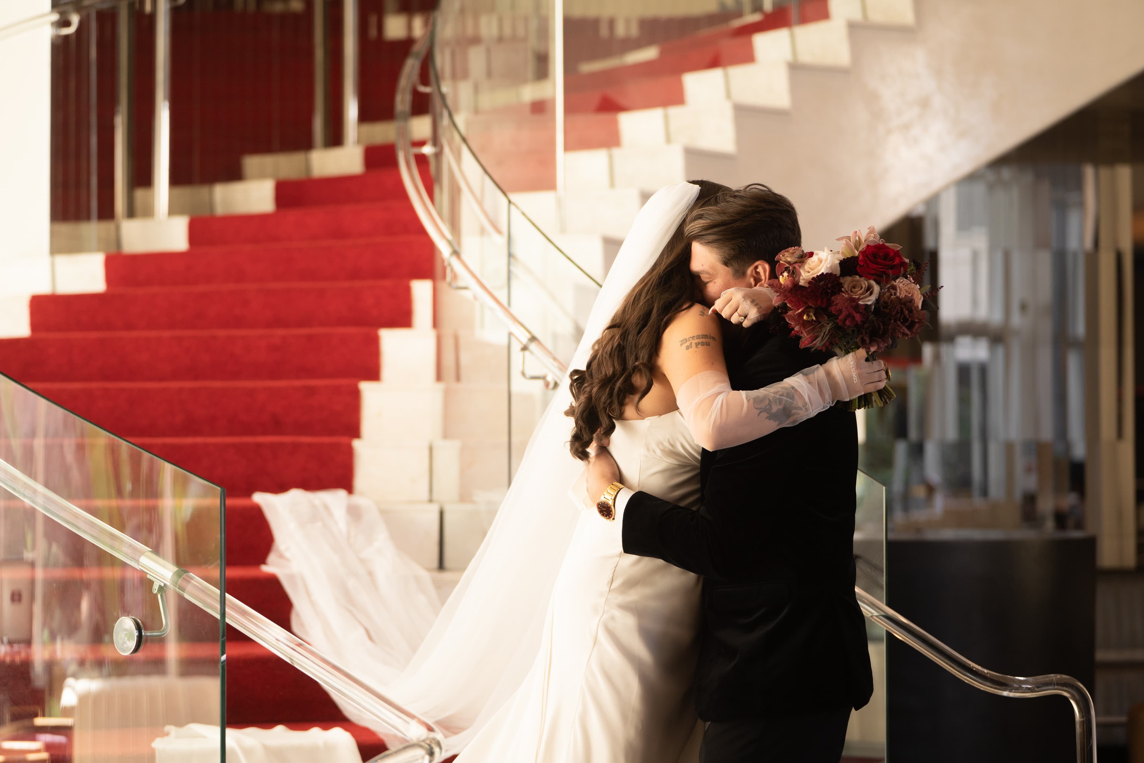 Red stairs, a held breath.